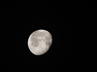 Detailed view of the waxing gibbous Moon against a black sky, showing craters and maria. A sharp, high-contrast astronomical capture.