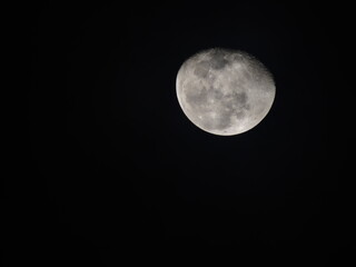 Detailed view of the waxing gibbous Moon against a black sky, showing craters and maria. A sharp, high-contrast astronomical capture.