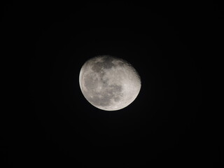 Detailed view of the waxing gibbous Moon against a black sky, showing craters and maria. A sharp, high-contrast astronomical capture.