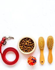 Dog food, leash, toy, and brushes arranged on a white surface, showcasing pet care supplies.