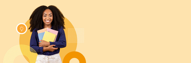 A smiling student stands confidently, holding several colorful notebooks in a modern learning environment. The background features soft colors, enhancing a positive educational atmosphere.