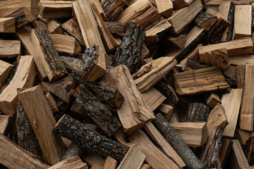 Dry chopped firewood for fireplace and stove. Eco-friendly natural wood fuel, perfect for heating, campfires and outdoor cooking.