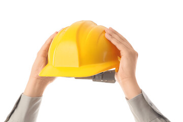 Male hands holding hardhat on white background