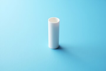 Minimalist Still Life White Cylinder on a Light Blue Background with Soft Shadow