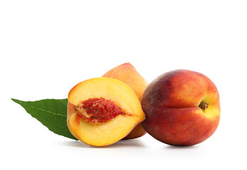 Sweet ripe peaches and leaf on white background