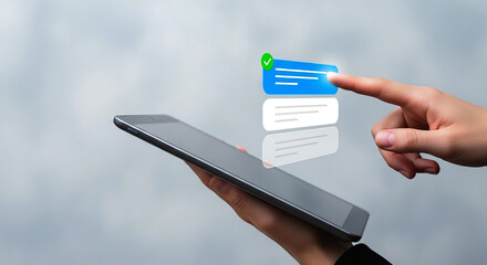 Person holding a tablet with message bubbles and a green checkmark on a light blue background
