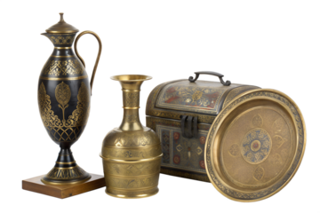 A curated collection of ornate vintage brassware, featuring a Middle Eastern ewer, engraved vase, decorative chest, and a traditional platter isolated on a white background