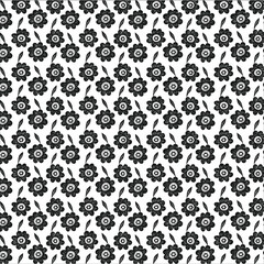 abstract symmetrical floral shapes arranged in a grid on a vivid hot pink background