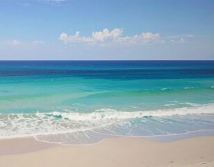 Obraz premium Tranquil ocean view, soft waves, sandy shore, bright sky