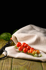 Juicy Garden Tomatoes on Wooden Table and Neutral Linen