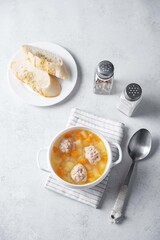 Potato soup with meatballs in a bowl