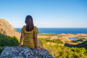 Naklejka premium Girl in the mountains