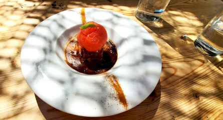 delicious, refreshing dessert on a table in a cafe. freshness and a light snack in the summer heat. summer, beach cafe. ice cream and cake