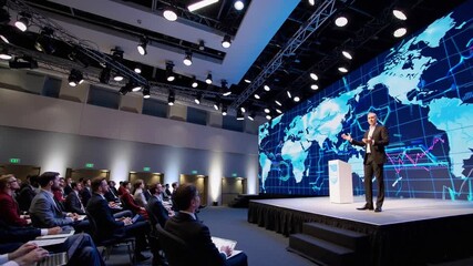 International conference discussing global trends in technology and business taking place in a modern auditorium