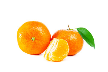 Juicy shiny whole and peeled tangerines with slices and leaf isolated on white.
