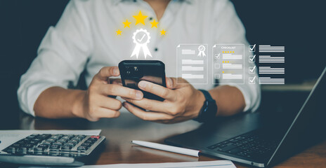 A businessman in a white shirt uses a smartphone while virtual icons display success metrics, awards, and achievement indicators.