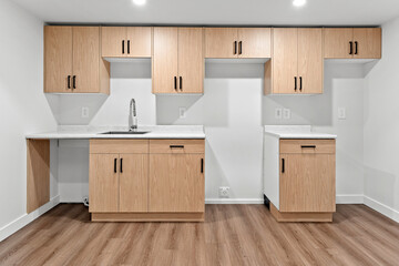 Kitchen with white cabinets and a sink