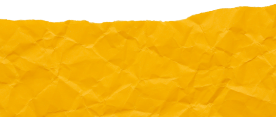 Ripped edge of honey yellow crumpled paper, isolated textured scrap for collage in bright colors