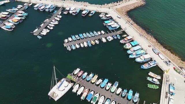Aerial view of the marina with boats and yachts in old town of Nessebar. Drone view from above. Summer holidays destination
