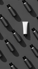 Fototapeta premium Minimalist cosmetic products on dark gray surface