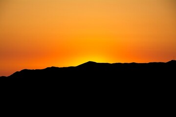 Colorful Sunset Silhouette of Mountains
