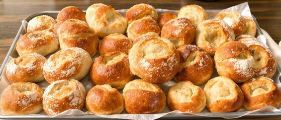 Variety of Bread Rolls Arranged on Tray