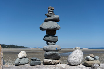 Inukshuk stacked on a sunny summer's day