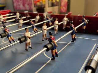 Table football players ready for kicking a ball