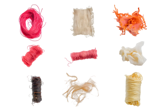 Colorful twine with various textures floats on black. Use for abstract backgrounds, arts and crafts concepts, product photography.