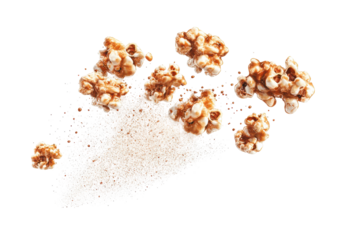 Caramel popcorn clusters with powdered sugar isolated on transparent background. Flying delicious popcorn isolated on white background.