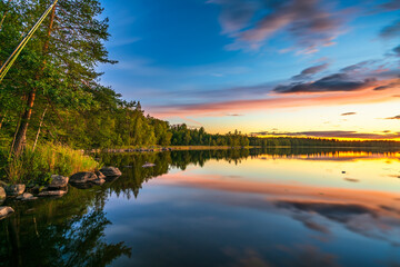 Hallangen lake at sunset. Kalmar region in Sweden. Europe