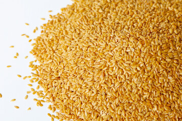 Organic golden flaxseeds, rich in omega-3, fiber, and antioxidants