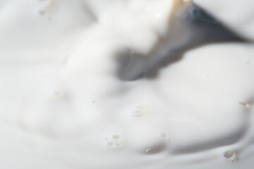 Close up shot of fresh milk as background