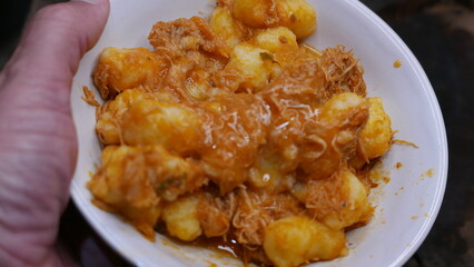 POV of someone eating Gnocchi with chicken. Gnocchi in a plate. Gnocchi meal.