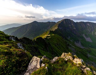Fototapeta premium Serene Mountains Landscape under Cloudscape, Grassy Peak Rocky Terrain View