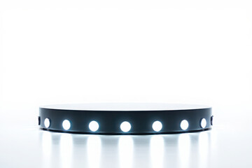Rotating display stand with illuminated led lights on a white background