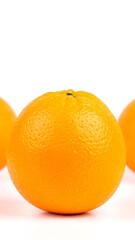 Close-up of three oranges