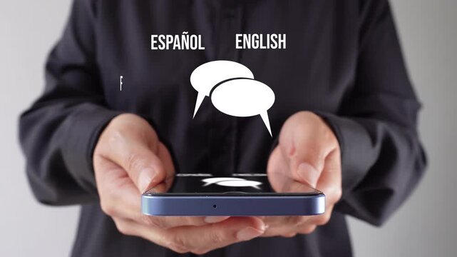 Online translation. Person showing a cell phone with an animation of a pair of speech bubbles with several different languages ​​around it.