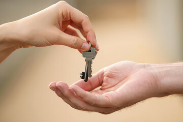 Handing over a key to a new home or property
