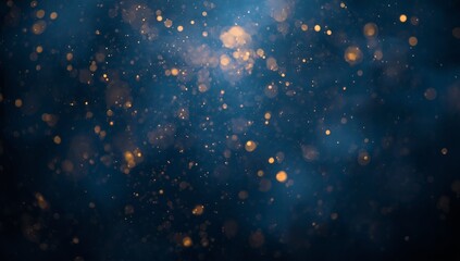 Shimmering golden particles on a deep blue background