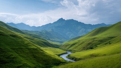 Obraz premium Sunset kayaking valley river meander soft cloud, green hill and distant mountain horizon glow, tranquil adventure feeling and gentle breeze
