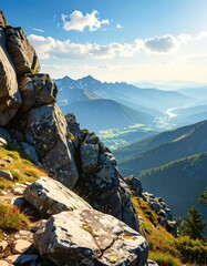 Mountain vista from a rocky peak.  A scenic high-angle view of a mountain range with valleys, hills, and a distant river.  Large, weathered rocks are prominent at the foreground. 