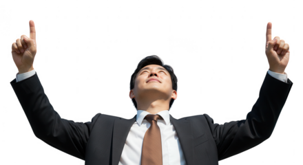 Man in suit looking upwards with arms raised and fingers pointing isolated on transparent background