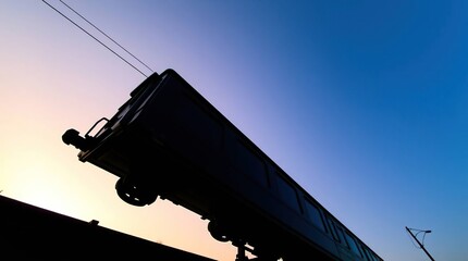 Obraz premium Train Silhouette Sunrise.