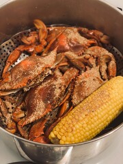 Blue Claw Crabs Cooked in a Pot with Corn on the Cob 