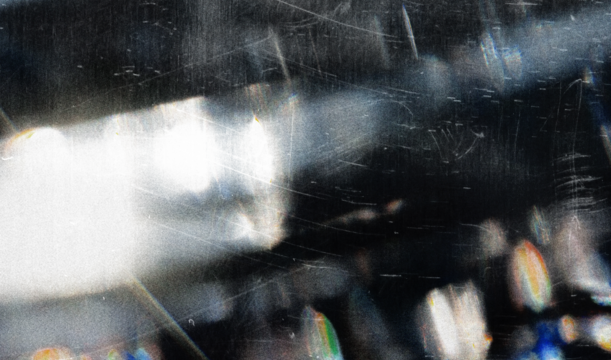 Vintage photo lens vignette template with dust and splatters and red glare on transparent background (png image). Useful for design, vintage film effects, and backgrounds