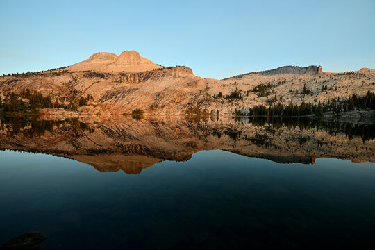 The early morning light on Mount Hoffman (10,850') above May Lake in Yosemite National Park, California.
