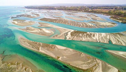 Aerial View of a Tidal Estuary with Sandbars and Turquoise Water