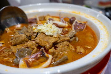 Delicious Thai Tom Yum Soup with Fresh Seafood and Spicy Broth