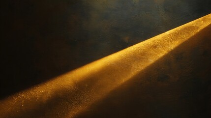 Diagonal beam of golden light illuminating a dark, textured surface, creating a dramatic and atmospheric effect